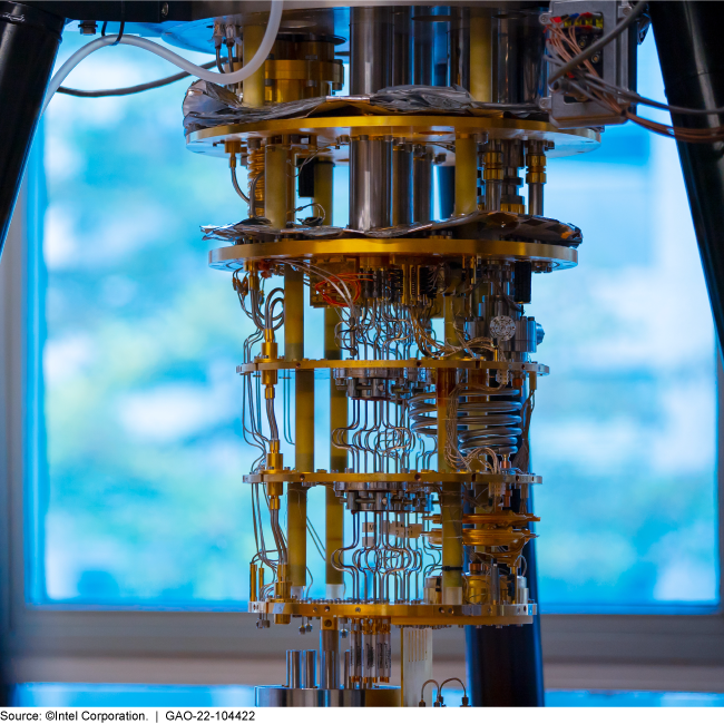 A close up view of the cylindrical shaped hardware of a quantum computer.