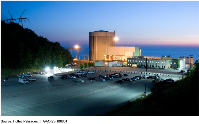 Parking lot with a nuclear energy facility in the background