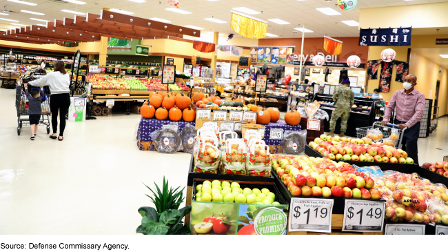 Produce area of the commissary with people shopping