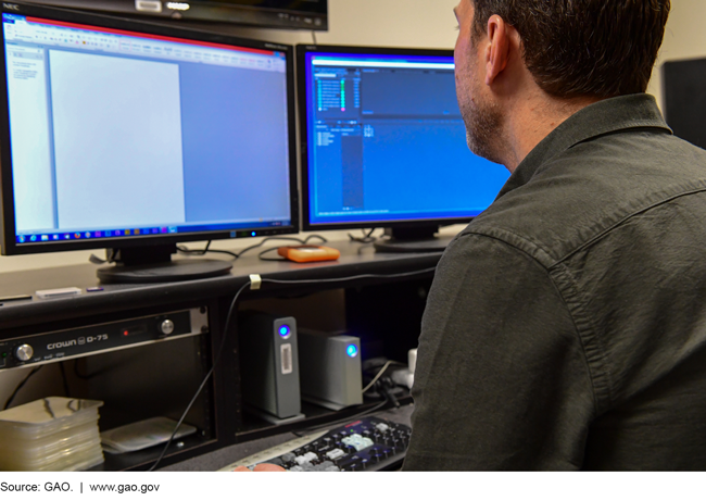 A man looking at a computer screen.