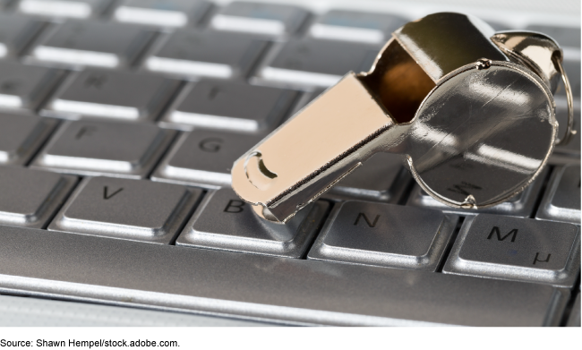 Whistle on a computer keyboard. Whistle on a computer keyboard.