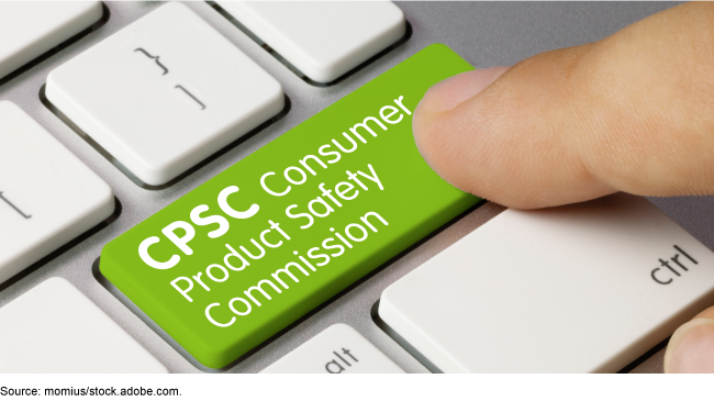 A person's finger pressing a Consumer Product Safety Commission button on a keyboard