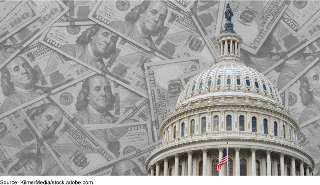 The U.S. Capitol building in front of a background of $100 bills.