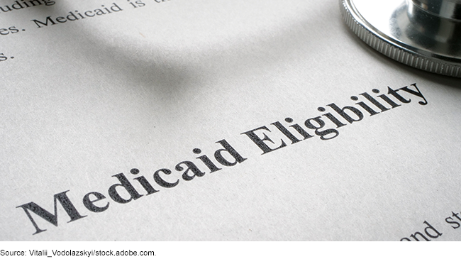A piece of paper with the words Medicaid Eligibility typed on it, in the style of a report or a piece of legislation. 