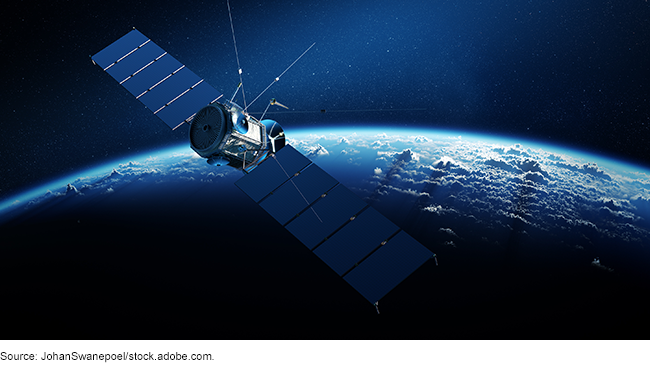 Satellite in space orbiting Earth