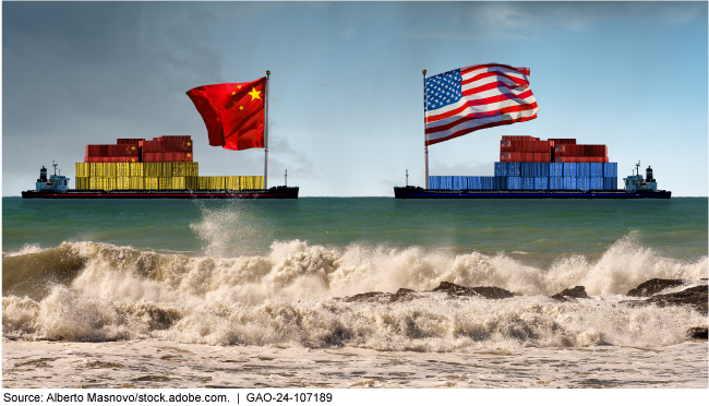 A container ship flying a Chinese flag facing a container ship flying an American flag in the open water.