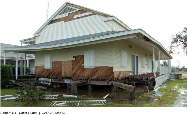 The exterior of a building with significant hurricane damage