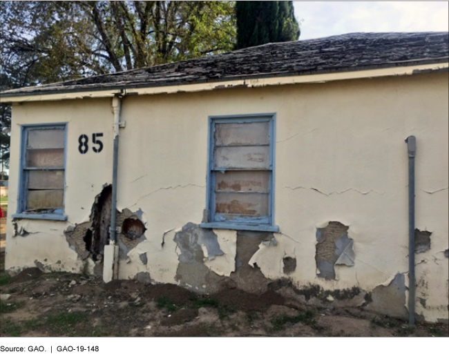 This is a photo of a VA property with damage to the exterior. 