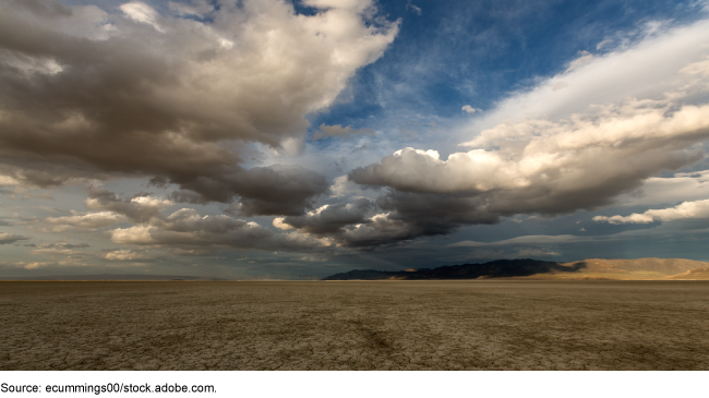 Clouds over a desert landscape.