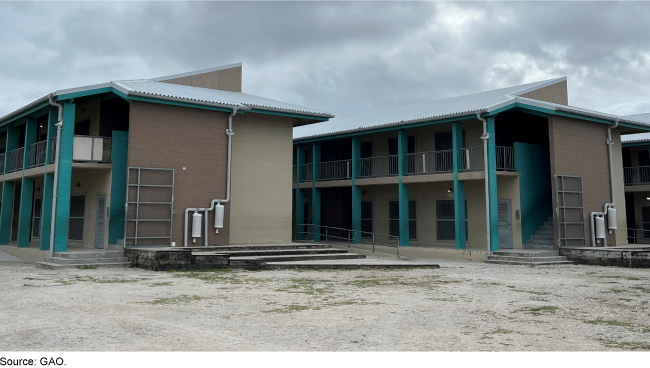 Multiple buildings with outdoor hallways.
