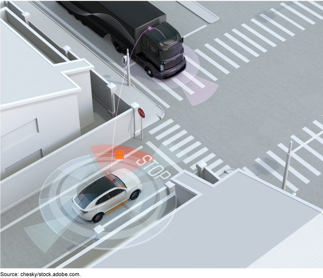 An illustration of a car and semi-truck on a road emitting radio frequencies. 