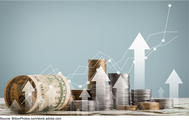 Piles of coins and American currency with stylized white arrows and dotted lines superimposed on top pointing upwards. Piles of coins and American currency with stylized white arrows and dotted lines superimposed on top pointing upwards.