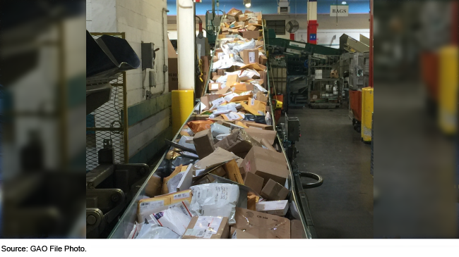 Packages on a conveyor belt inside a warehouse 