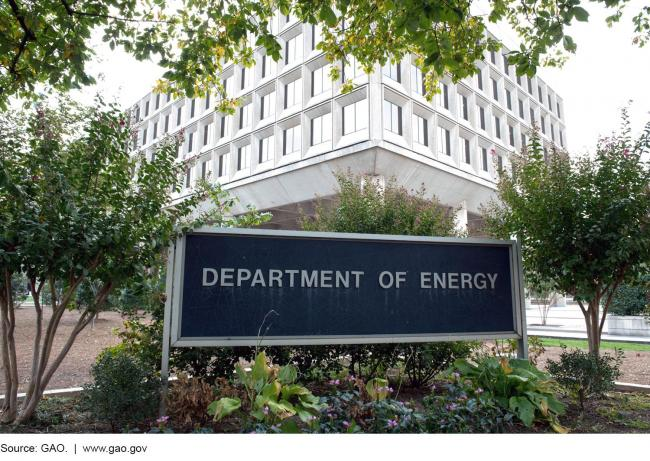 Department of Energy entrance sign with the building in the background