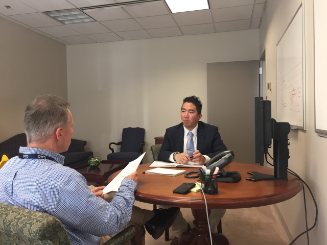 Photo of Taka Ariga, GAO’s first Chief Data Scientist and Director of the Innovation Lab, discussing his vision for Innovation Lab with Innovation Lab staff