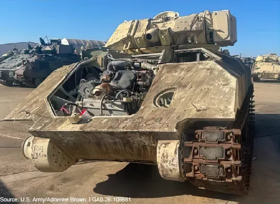 Photo showing a Bradley Fighting Vehicle that needs major repairs.