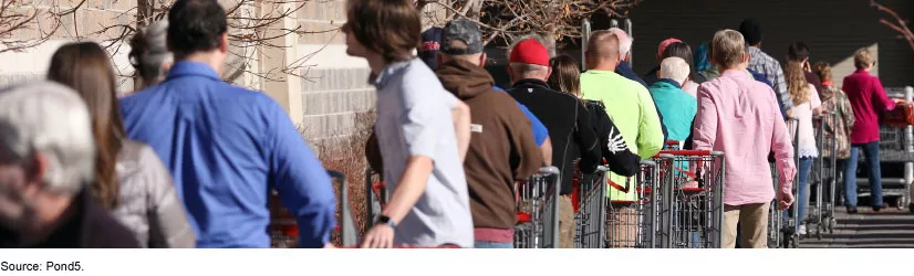 line of people waiting at a grocery store