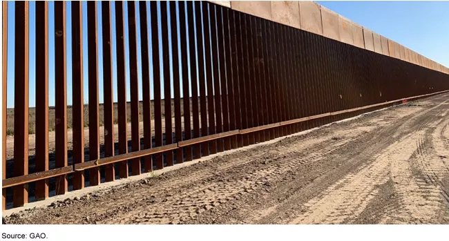 Photo of metal slats comprising the southern border wall with Mexico
