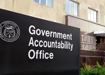 A photo of GAO headquarters in Washington DC. The sign in the photo reads "Government Accountability Office."