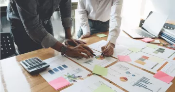 Charts and graphs on a table.