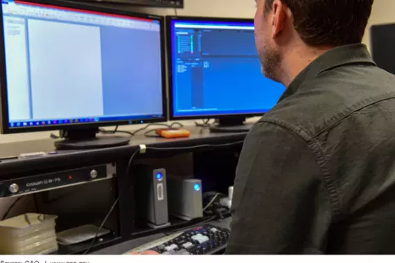 man using a desktop computer