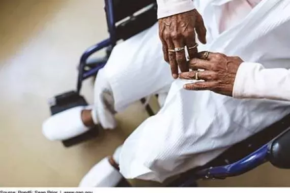 Photo of an older woman in a wheel chair