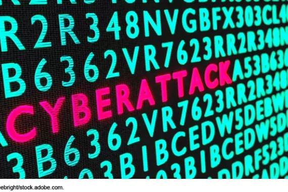 cyberattack art green computer screen coding with red 'cyberattack'