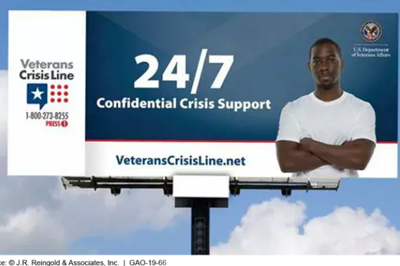 Photo of a billboard advertising the Veterans CrisisLine suicide hotline