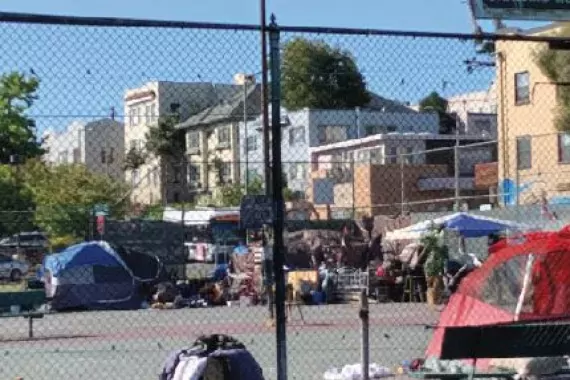 Photo of a homeless encampment in Oakland.