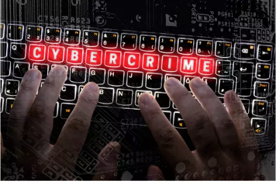 Illustration of a computer keyboard with the word &quot;cybercrime&quot; highlighted in red on the keys.