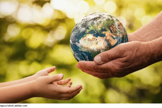 Illustration of an adult's hands cradling the Earth and and handing it down to a child's hands.