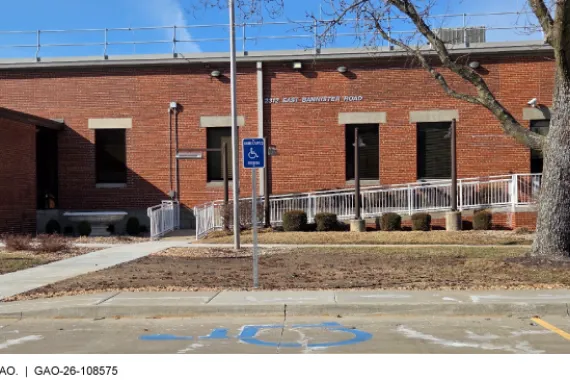 Accessible parking space and ramp at federal office building.