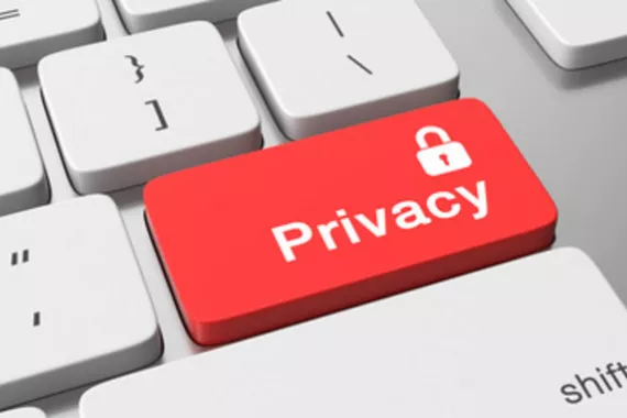 A keyboard with a red button that says privacy and has a padlock on it.