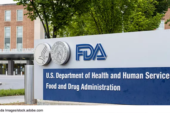 A sign outside the Food and Drug Administrator's headquarters building that says FDA, U.S. Department of Health and Human Services, Food and Drug Administration.