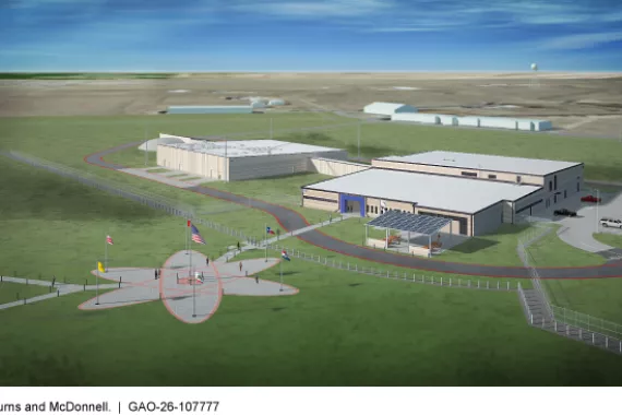 Artists' rendering of a nuclear research facility with two large, flat buildings and a paved area in the shape of a cartoon atom