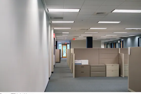 Office area with empty cubicles.