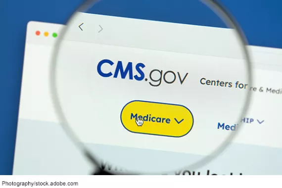 A view of the Centers for Medicare & Medicaid Services website through a magnifying glass, with the cursor on the Medicare button