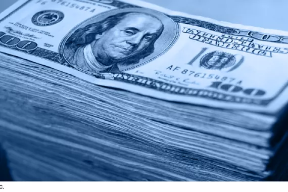 U.S. currency in denominations of $100 bills.