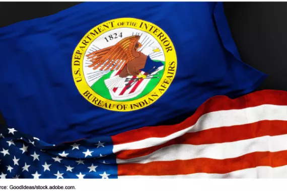 Picture of the Department of the Interior's Bureau of Indian Affairs flag and the American flag.