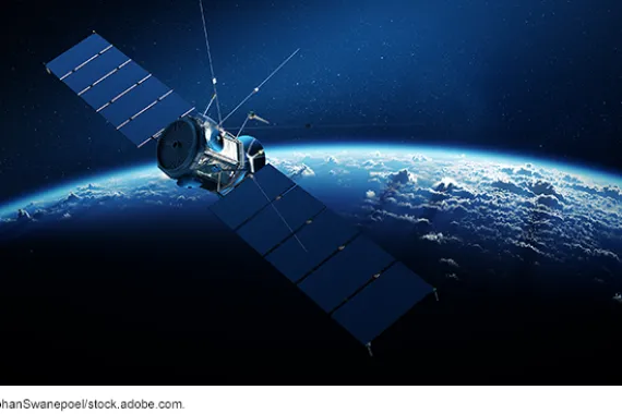 Satellite in space orbiting Earth