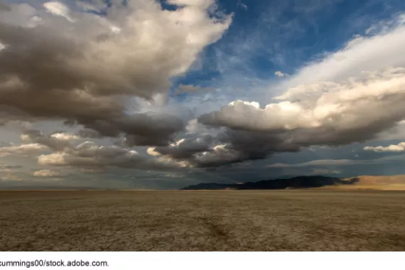 Clouds over a desert landscape.