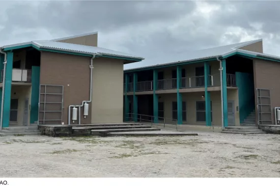 Multiple buildings with outdoor hallways.