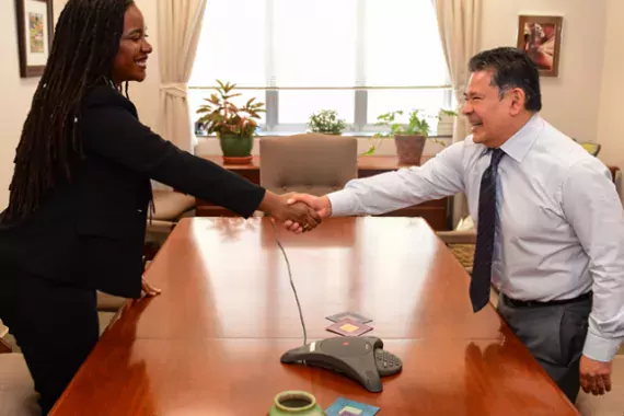 Photo Showing Two Federal Employees Shaking Hands