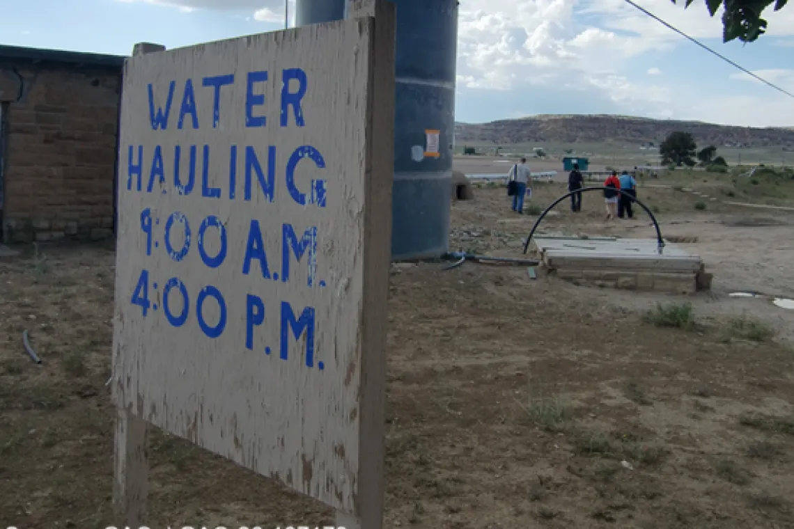 A photo of a sign for water hauling.